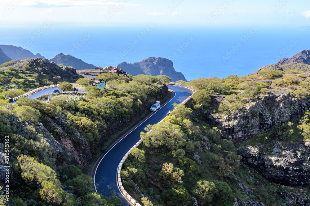 Cars driving on mountain zig-zag road in the island Tenerife, Canary, Spain. Starts in Masca and finishes in Santiago del Teide