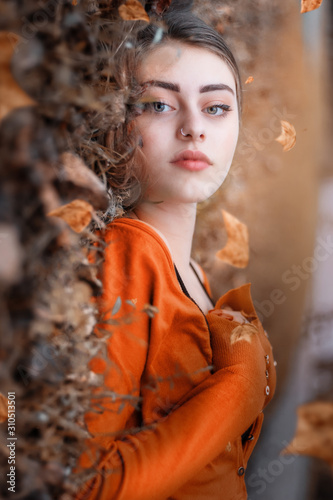 A woman with the colors of autumn