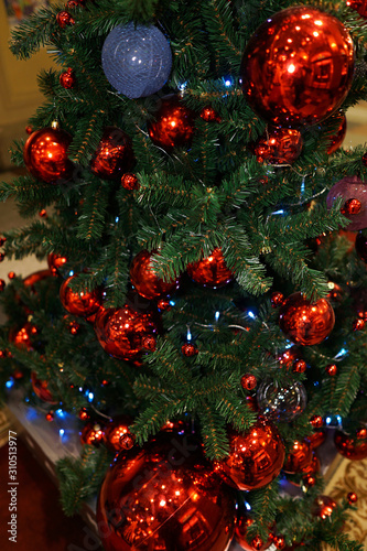 Christmas decorations on the Christmas tree. Red ball.