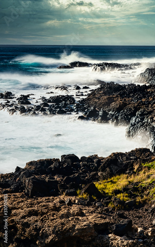 Rugged volcanic coastline of the Yokohama Bay side of Kaena Point Oah photo