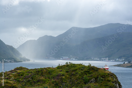 Rough and majestic view of the mountains in Norway around Måløy. Dramatic lighting