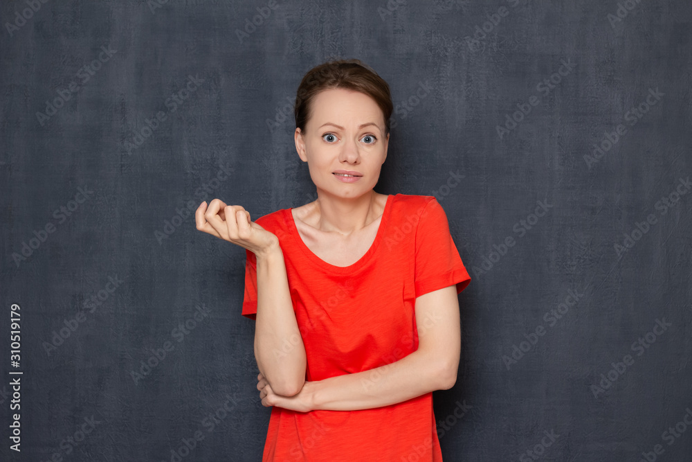 Portrait of upset bewildered girl not understanding what happened