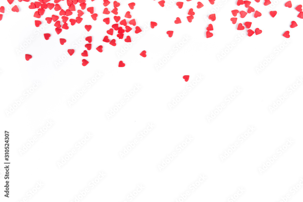 White background with red hearts. Valentine's day concept. Top view. Copy space for text. White background with red hearts. Valentine's day concept. Top view. Copy space for text.
