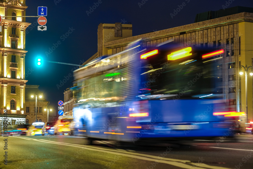 Moscow, Russia - October, 28, 2019: image of a bus on a night street in Moscow