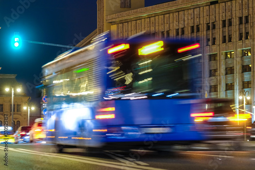 Moscow, Russia - October, 28, 2019: image of a bus on a night street in Moscow photo