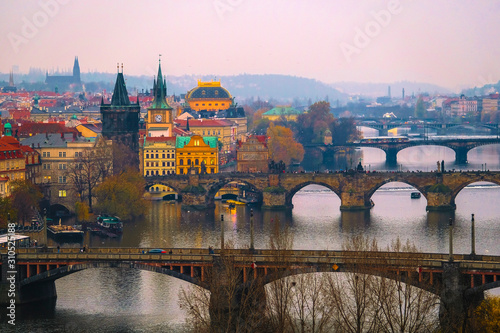 Prague, Czech Republic - November, 22, 2019: Prague landscape with view of Charles bridge photo