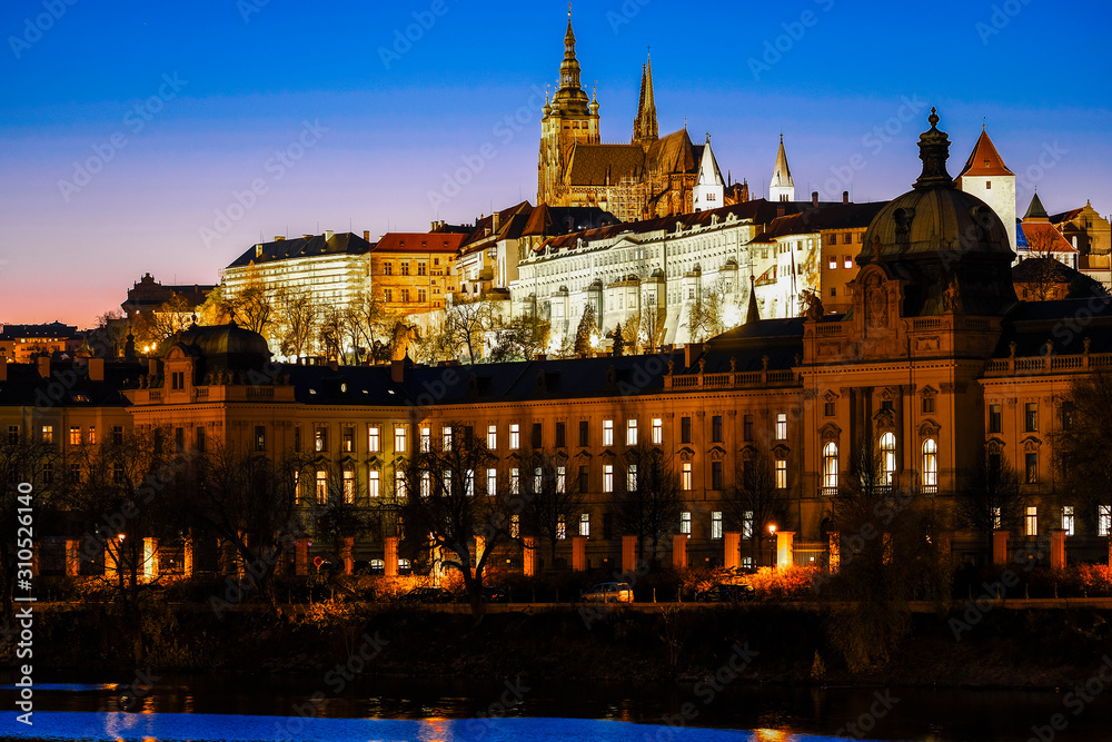 Prague, Czech Republic - November, 19, 2019: landscape withe the image of St. Vitus Cathedral at night in Prague