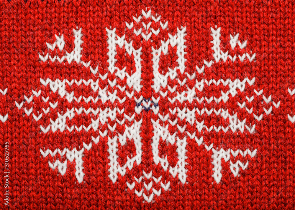 Red knitted fabric with nordic geometric ornament