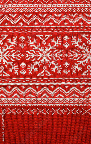 Red knitted fabric with nordic geometric ornament