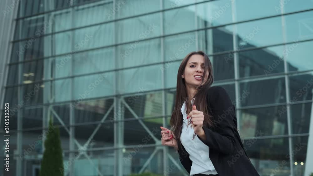 Serious Business Lady Dances Jokingly And Becomes Serious Again. Serious Business Lady Dances Jokingly And Becomes Serious Again.