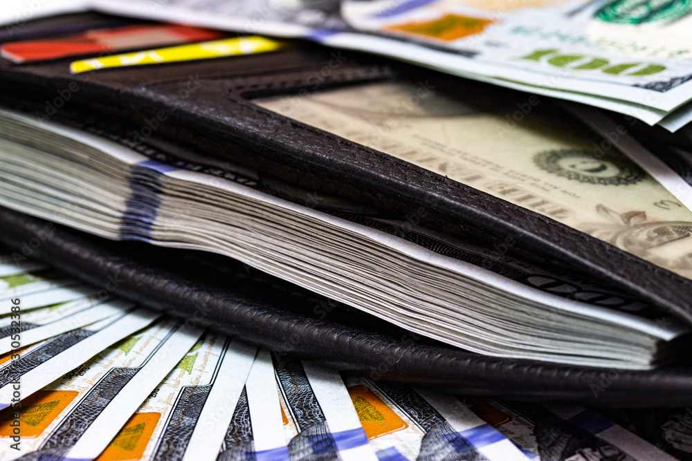 Purse filled with money macro close up Purse filled with money macro close up