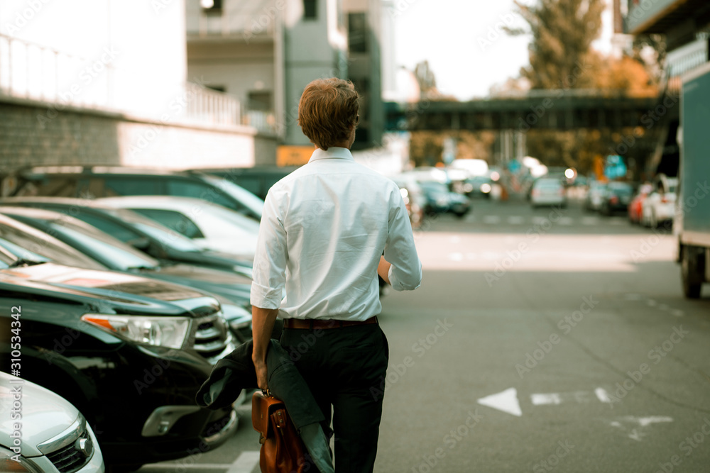 The Businessman Is Having A Walk Around The City The Businessman Is Having A Walk Around The City