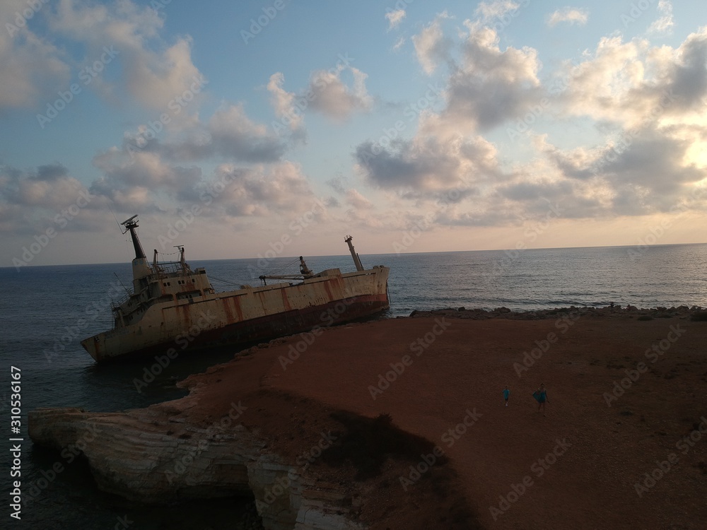 Edro III - Ship after a shipwreck, coast with cliffs at sunset, Cyprus, Mediterranean Sea
