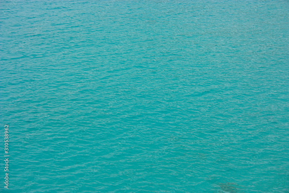 Obraz premium expanse of crystal clear blue water of the sea of ibiza