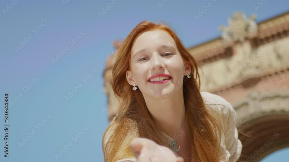 Closeup pretty woman sending air kiss outdoor. Smiling woman having fun Closeup pretty woman sending air kiss outdoor. Smiling woman having fun