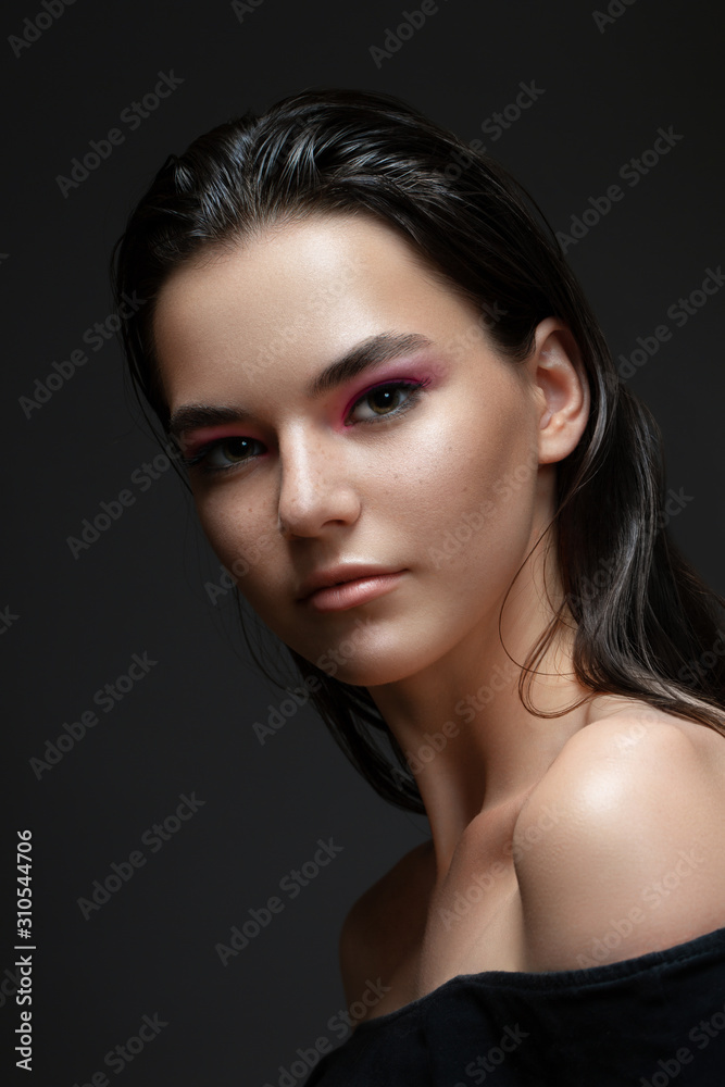 Beautiful model girl with elegant haircut. Woman with pink make-up. Cosmetics, beauty. Beautiful model girl with elegant haircut. Woman with pink make-up. Cosmetics, beauty.