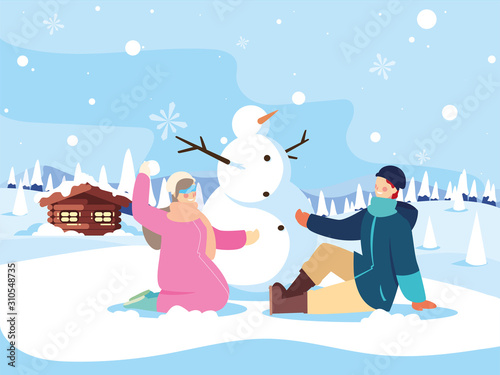 couple of people with snowman in winter landscape