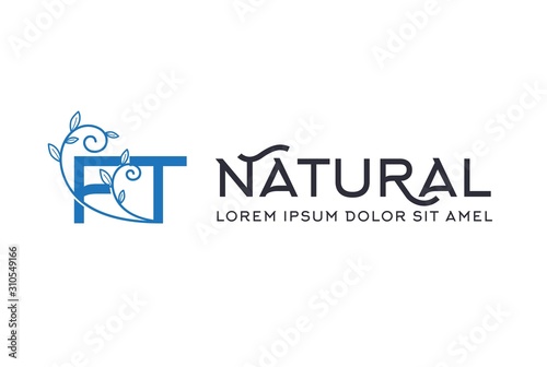 Creative blue floral wedding initial FT icon design with horizontal text. Vector logo template