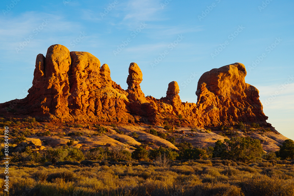 An amazing set of sandstone sculptures in the heart of Arches National Park in the late afternoon light.