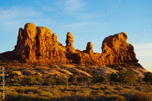 An amazing set of sandstone sculptures in the heart of Arches National Park in the late afternoon light.