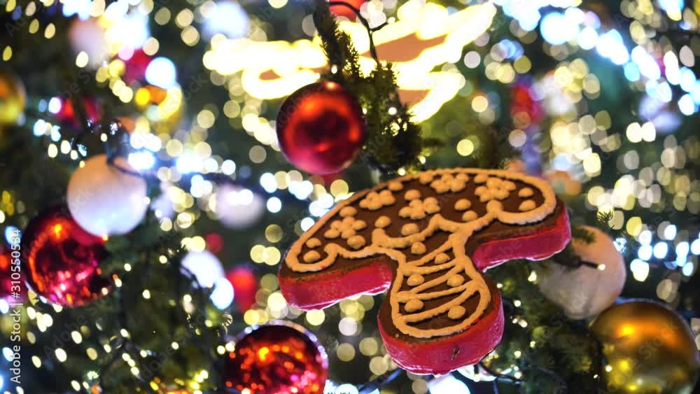 Christmas tree decoration - a decorated mushroom and several colorful bowls Christmas tree decoration - a decorated mushroom and several colorful bowls