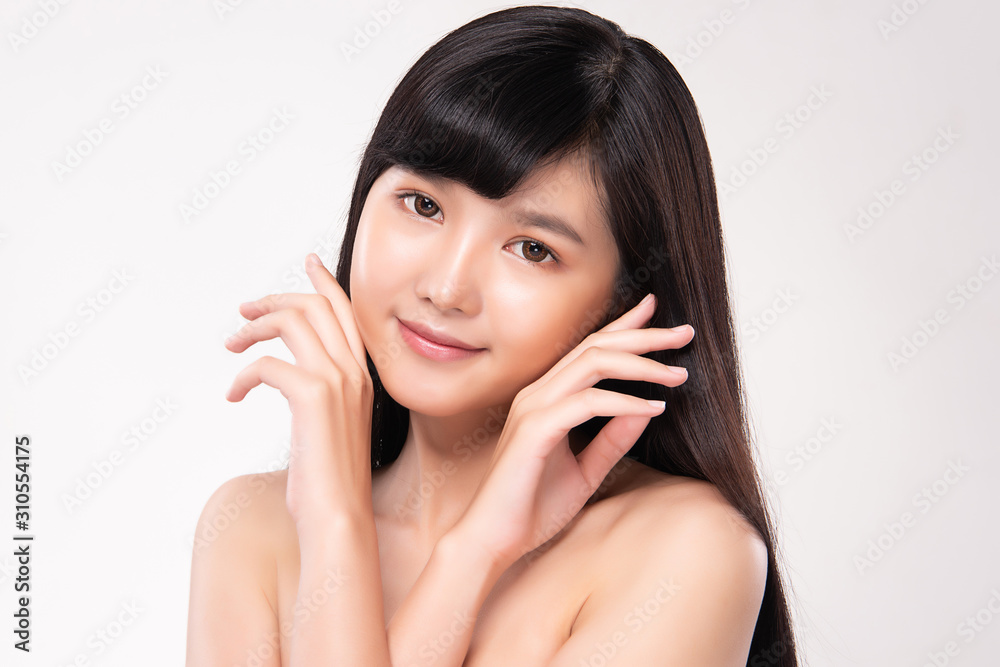 Beautiful Young Asian Woman with Clean Fresh Skin. Face care, Facial treatment, on white background, Beauty and Cosmetics Concept. Beautiful Young Asian Woman with Clean Fresh Skin. Face care, Facial treatment, on white background, Beauty and Cosmetics Concept.