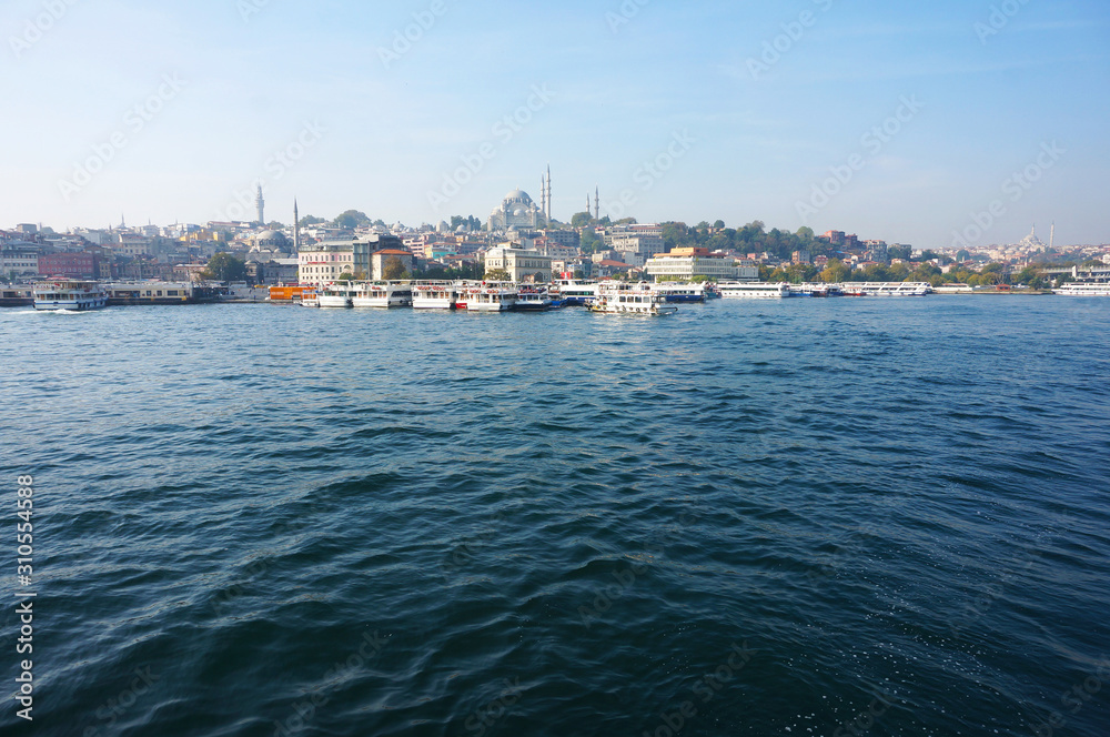 The beautiful and peaceful view of river bank inside Istanbul during sunny autumn morning.