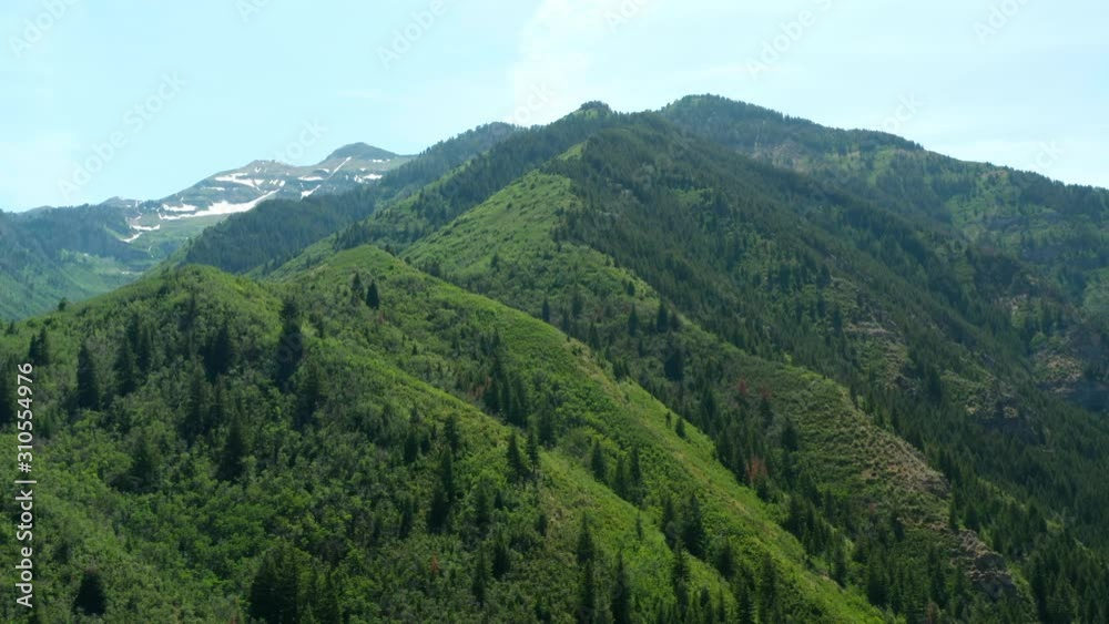 Pull back from beatiful lush mountains in Wasatch Mountain Range Provo Utah 4K Pull back from beatiful lush mountains in Wasatch Mountain Range Provo Utah 4K
