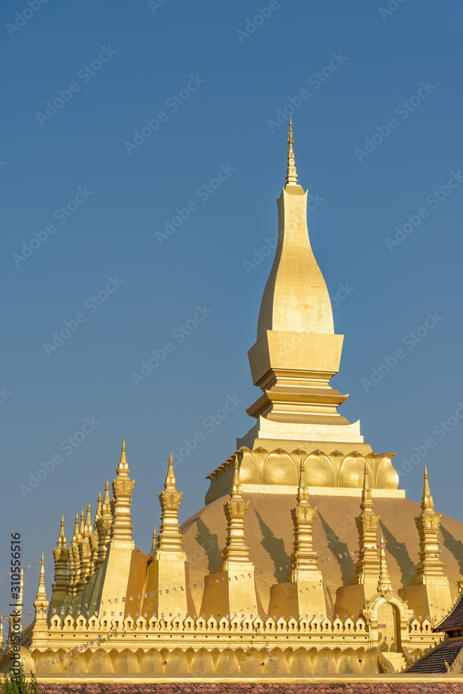 Naklejka premium VIENTIANE. LAOS - FEBRUARY 2, 2019: Wat Phra That Luang, Vientiane, Laos.