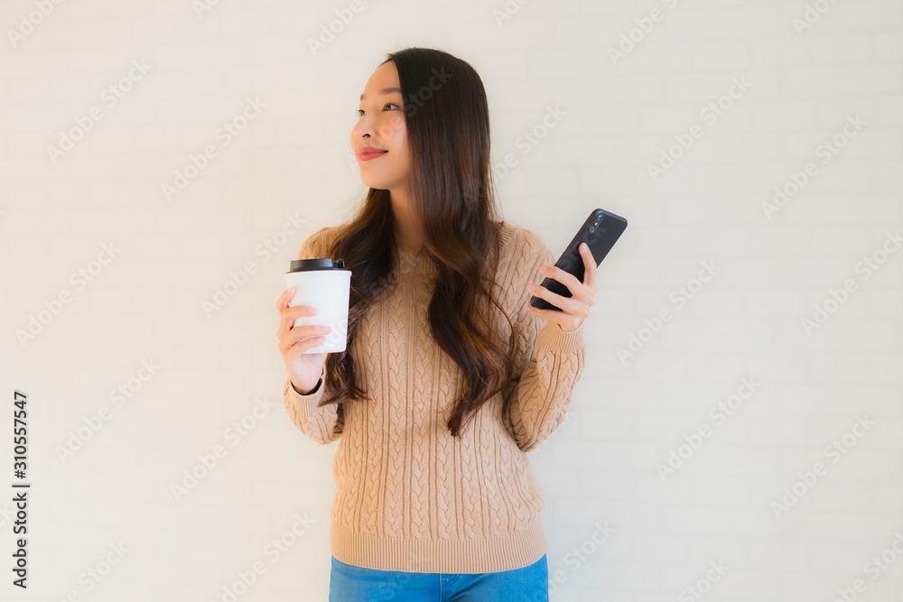 Portrait beautiful young asian women smile happy use mobile smart phone Portrait beautiful young asian women smile happy use mobile smart phone