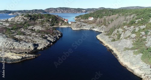 Areial footage of soouth norwegian coast islands and sea villige. photo