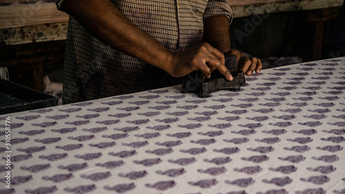 Man making traditional block batik print cloth