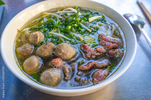 Famous cuisine- Vietnamese Pho beef noodles soup with meat balls 