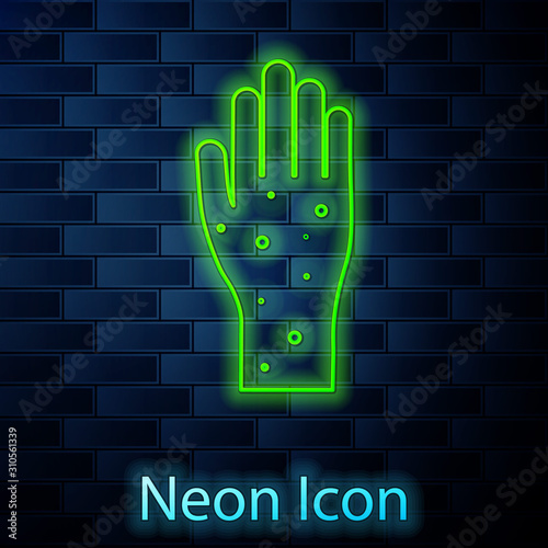 Glowing neon line Hand with psoriasis or eczema icon isolated on brick wall background. Concept of human skin response to allergen or chronic body problem. Vector Illustration