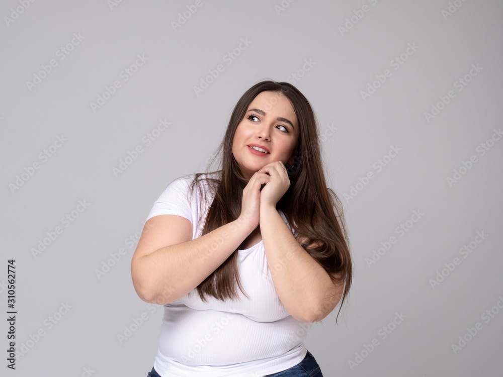 Smiling Plus Size attractive Woman dreaming. Smiling Plus Size attractive Woman dreaming.