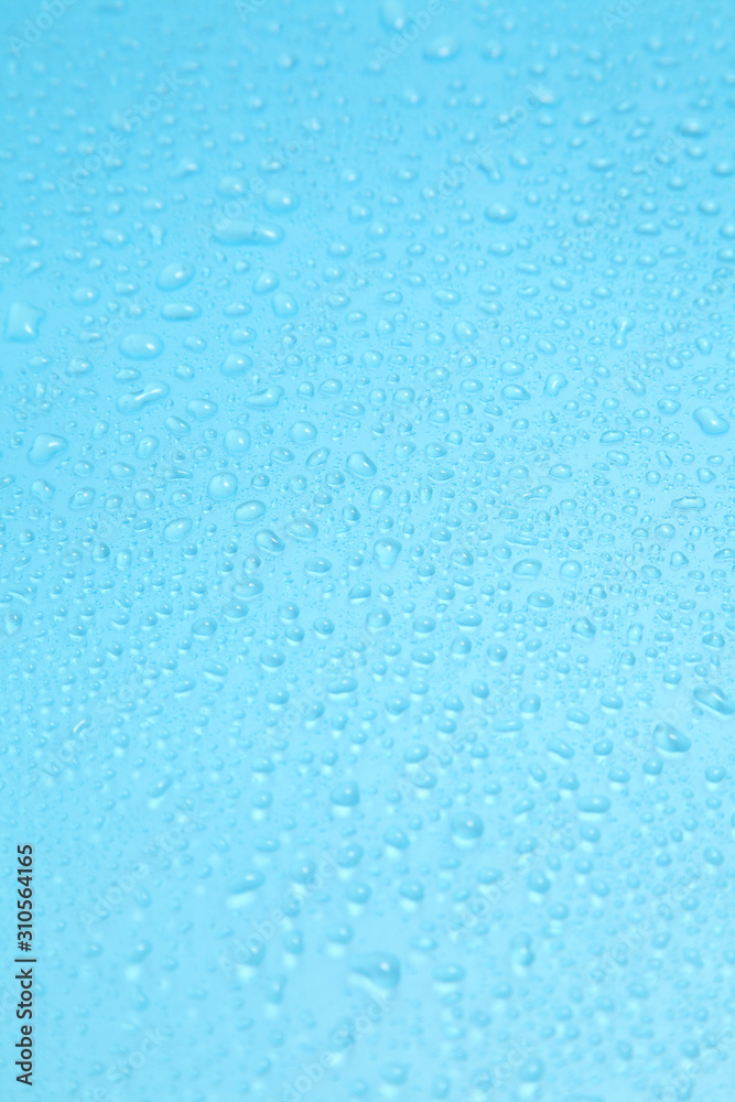 Close up water drops on blue background, Water drop in macro photography Close up water drops on blue background, Water drop in macro photography