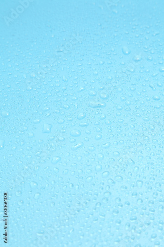 Close up water drops on blue background  Water drop in macro photography
