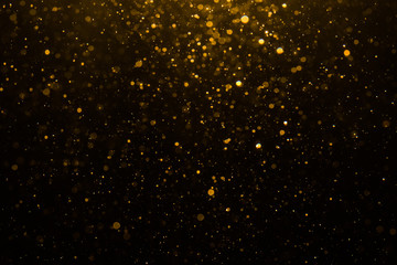 Abstract gold bokeh with black