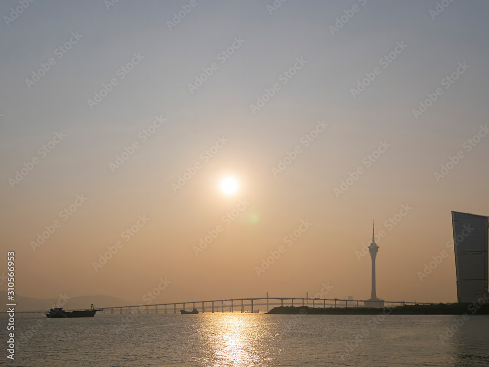 Sunset view of the building, tower, Kun Iam Statue, Macau Taipa Bridge