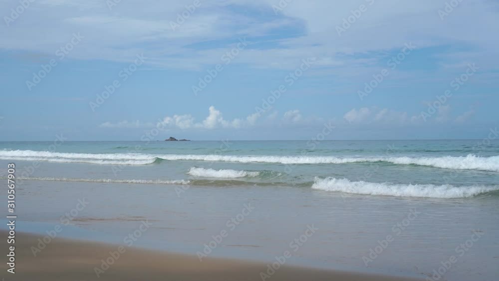 Beautiful tropical beach with blue sky and white cloud background. Summer vacation and nature environment concept. Beautiful tropical beach with blue sky and white cloud background. Summer vacation and nature environment concept.