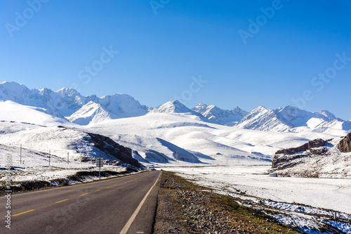 Snow mountain and road in Xinjiang, China