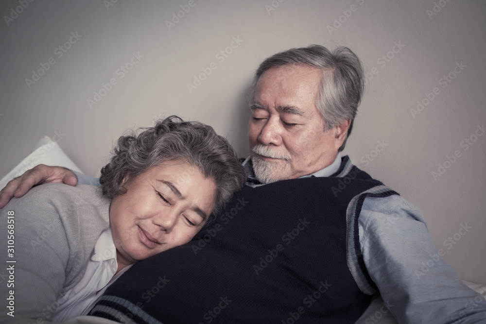 elderly couple caucasian senior man and woman sleeping and rest together in white blanket in bedroom, retirement health care with love lifestyle concept elderly couple caucasian senior man and woman sleeping and rest together in white blanket in bedroom, retirement health care with love lifestyle concept
