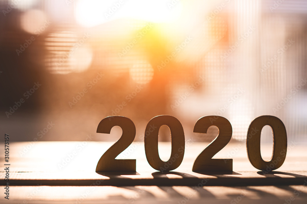 2020 text with wood cut on wooden floor on white background in happy new year 2020 concept 2020 text with wood cut on wooden floor on white background in happy new year 2020 concept