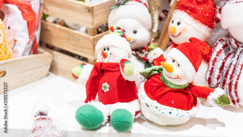 Snowmen that are sold in stores during the Christmas and New Year.
