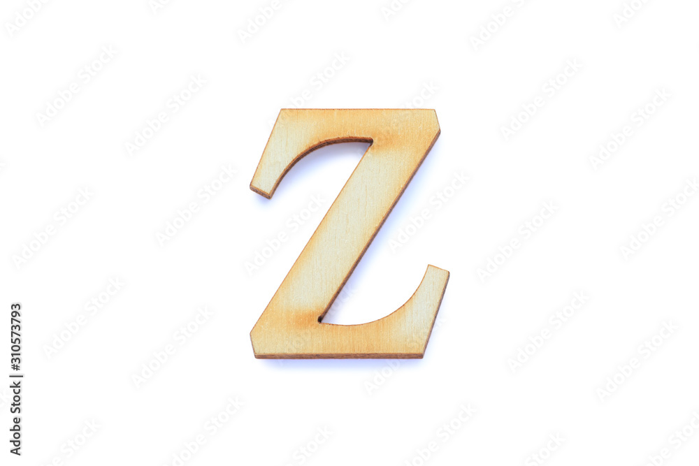 Alphabet letter wooden font with shadow isolated over white background. English flat wood character Z.