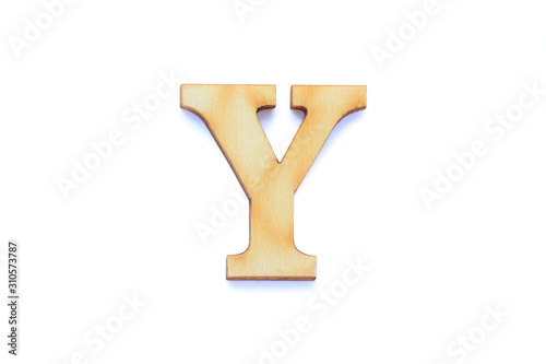 Alphabet letter wooden font with shadow isolated over white background. English flat wood character Y. photo