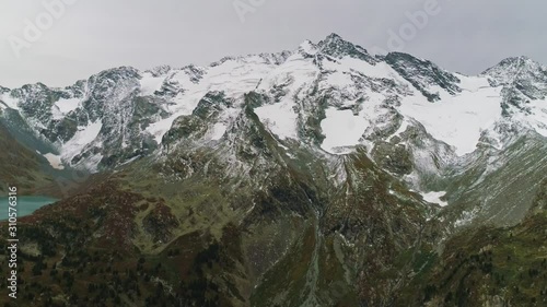 Wallpaper Mural Rear drone fly from snow range reveal cascade of two milky green lake basins Torontodigital.ca