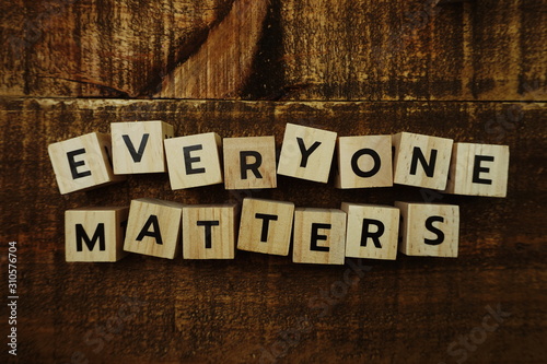 everyone matters letters on wooden background business concept for equality respect