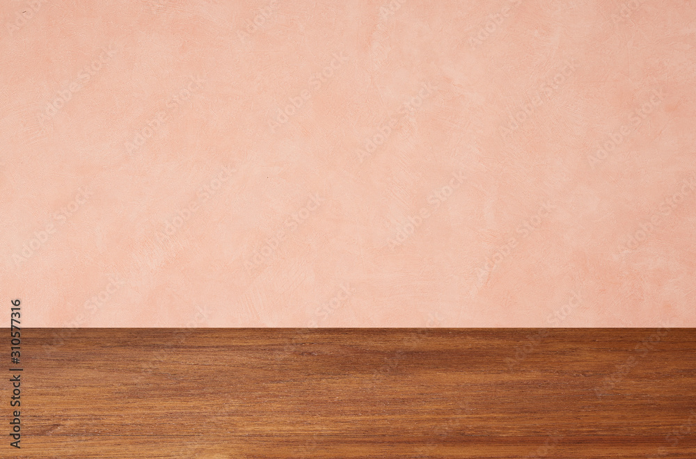 Empty wooden floors on pink wallpaper background Empty wooden floors on pink wallpaper background