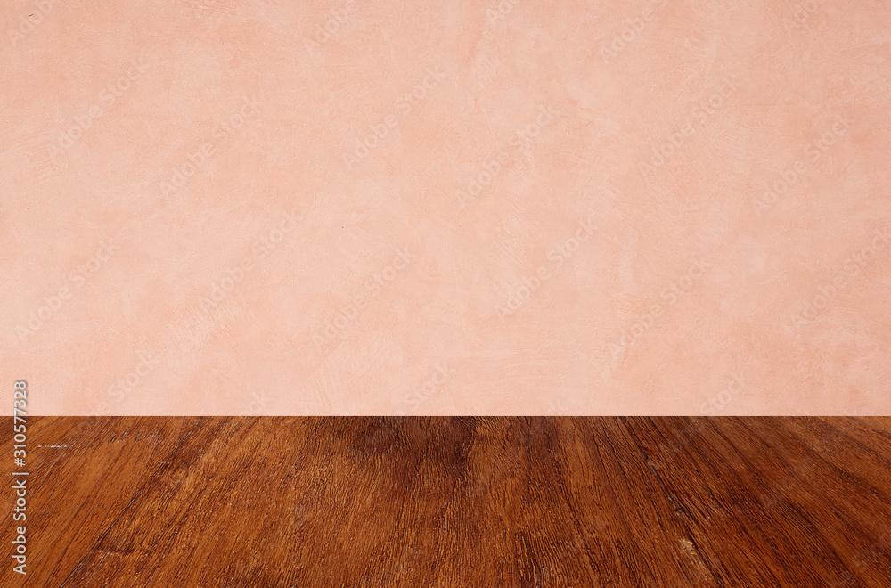 Empty wooden floors on pink wallpaper background Empty wooden floors on pink wallpaper background